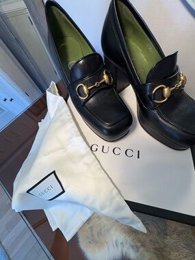 Gucci Black Leather Platform Loafers with Gold Accents